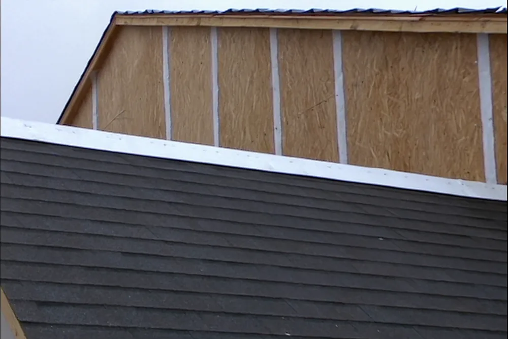 Roof sheathing with sealing tape over the panel seams during a re-roof in Oklahoma